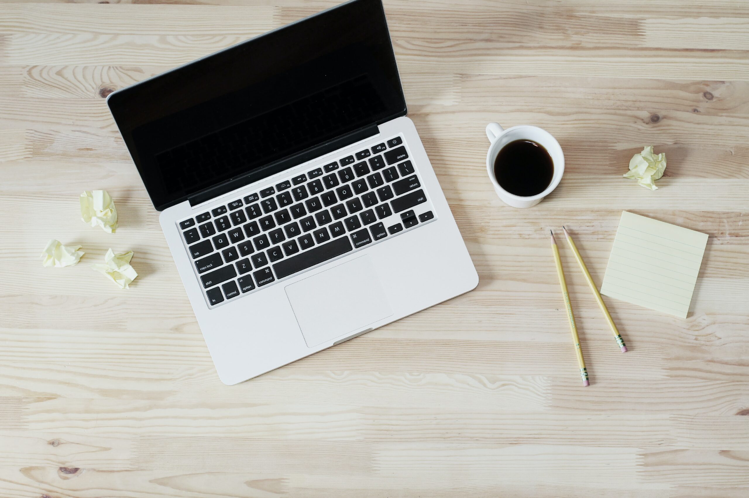 laptop and coffee with crumpled papers 2