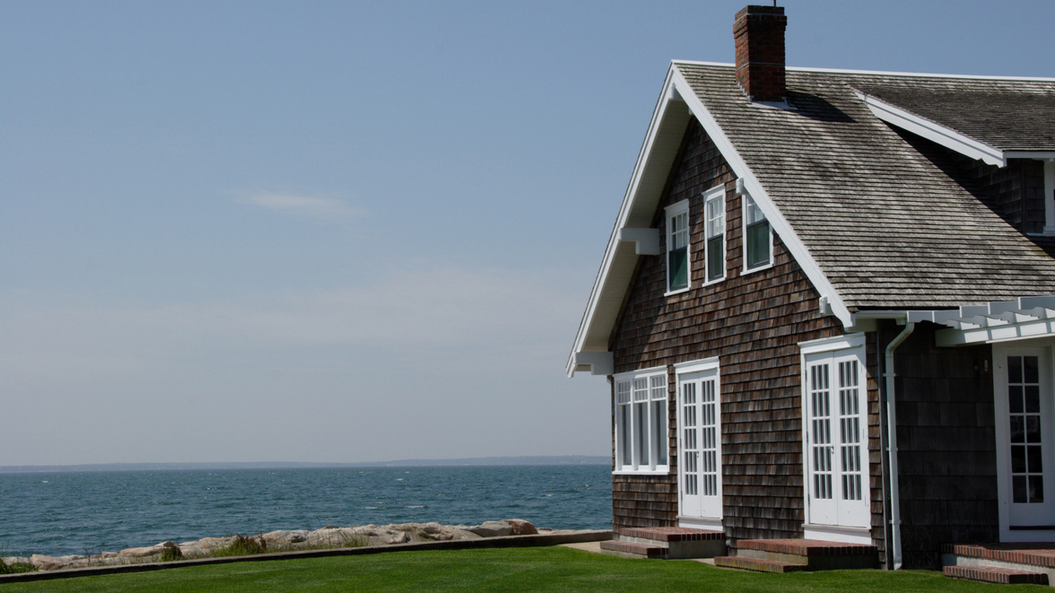 brown home by the sea